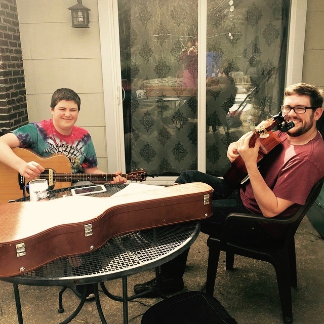 Teaching Brady (age 16) Stairway to Heaven during an in-home lesson on a particularly nice day